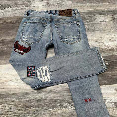 SeX PiStOlS hadirkan jeans high waist knalpot stainless elegan akses cepat image 1