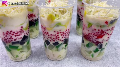 ES TeLeR VIRAl contoh nyata Akses kemeja flanel casual dan puzzle memori Pilihan image 1